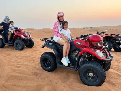 FamilyQuadbikeRidewithKid.webp